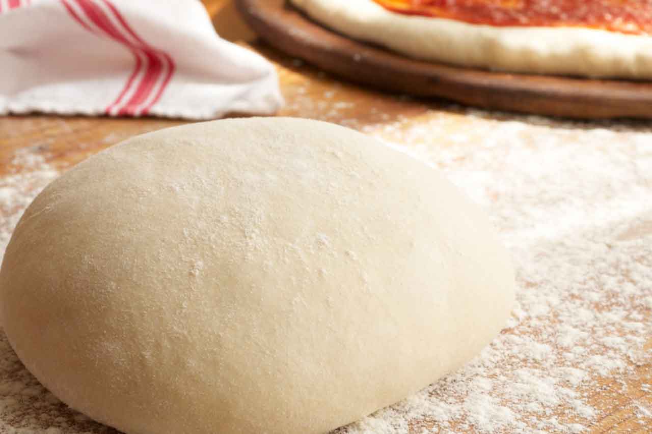 A Melhor Receita de Massa de Pizza Caseira - Uma Delícia Que Vai te Surpreender!